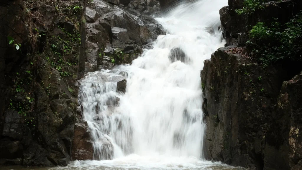 Namtok Phlio Waterfall flowing through forest in Chanthaburi